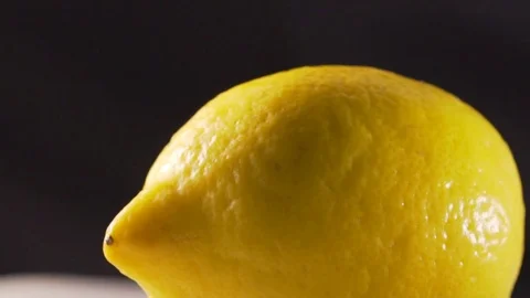The chef squeezes out the lemon juice Stock Footage 83346372