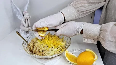 Chef Squeezing Fresh Orange Juice over Apple Strudel Filling 4K 스톡 동영상 333242849