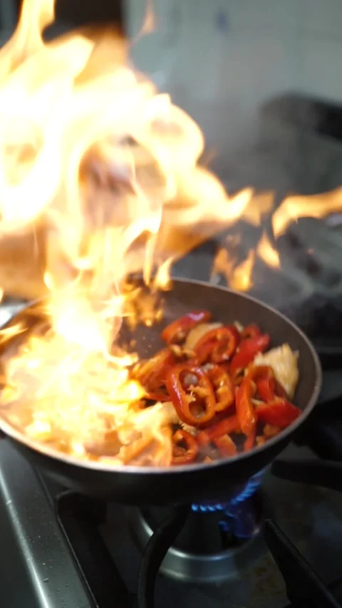 Chef Squeezing Lemon on Sizzling Shrimp in Wok Pan Close-Up Video stock 294803827