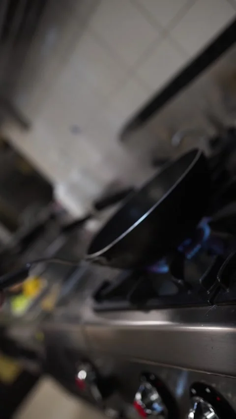 Chef Squeezing Lemon on Sizzling Shrimp in Wok Pan Close-Up Stock Footage 294803942