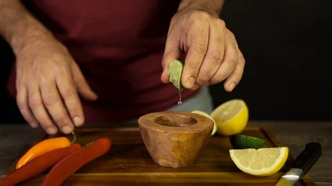 Chef Squeezing Lime Stock Footage 104983301