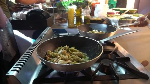 Chef squid With Seafood Is Fried In A Frying Pan Stock Footage 105886991