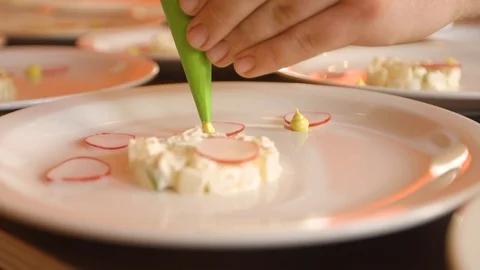 Chef Squizing Sauce On Plate Stock Footage 127036143