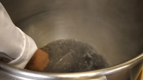 Chef steams vegetables in steamer boils water heat restaurant z's steak and c Stock-Footage 89363775