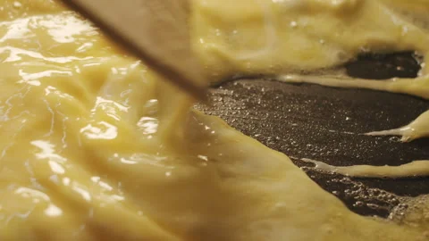The chef stir the frying scramble eggs with a wooden spatula 스톡 동영상 152649409