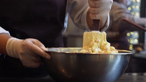 Chef stir melted chocolate, slow motion Stock Footage 122196800
