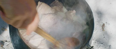 Chef stirring meat in cooking pot Stock Footage 106219181