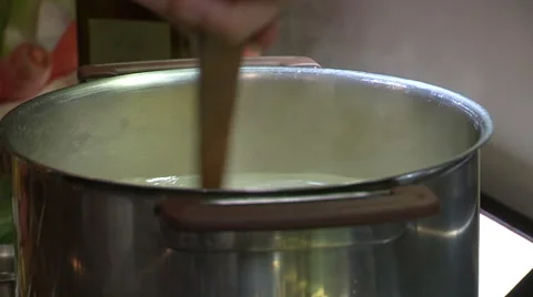 Chef stirring pasta boiling in hot water Stock Footage 50962823