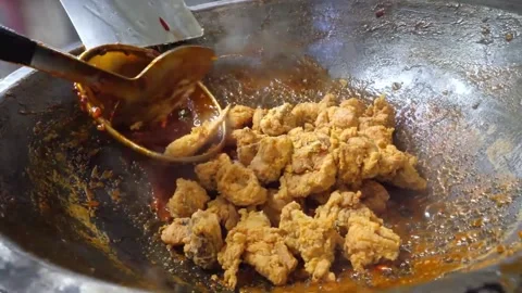 Chef Stirring Red Hot Chili Sauce in Large Wok Video stock 343028042