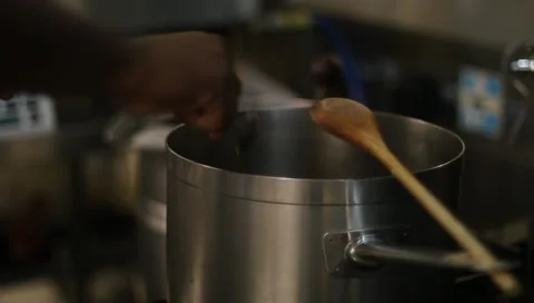 Chef stirring soup Stock-Footage 10682663