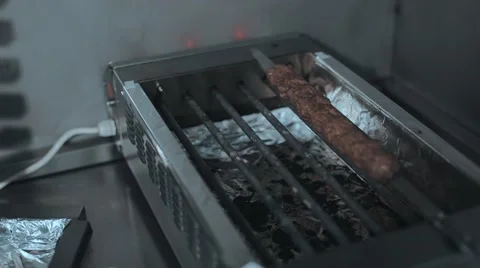 Chef stringing meat on a skewer 库存影片 67900905