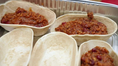 Chef stuffing baked puff pastry with fried mince in tomato sauce, traditional Stock-Footage 164386492