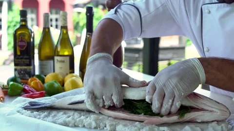Chef Is Stuffing Raw Fish With Fennel, Carp Fish On The Board, Cooking Fish Stock Footage 82222265