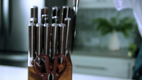 Chef takes the knife slow motion Stock Footage 222390569