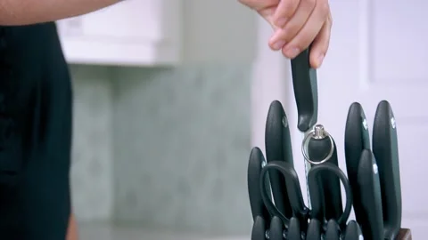 Chef takes the knife slow motion Stock Footage 223699657