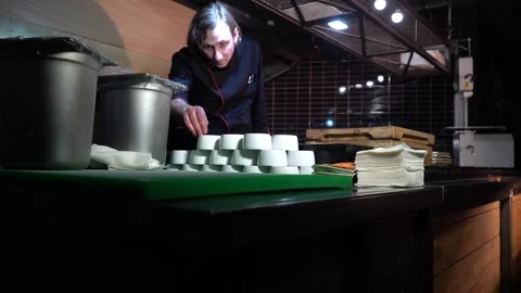 The chef takes salt in the kitchen 스톡 동영상 85671404