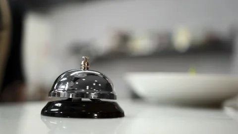 The chef taps the bell on the restaurant counter, the waiter takes the dish Stock Footage 164558790