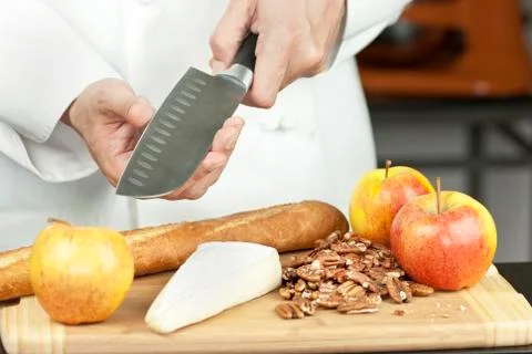 Chef tests knife sharpness Stock Photos