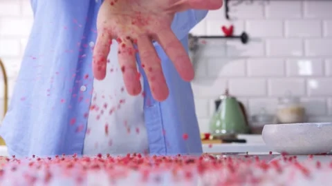 The chef is throwing pepper at the camera. Stock Footage 133021538