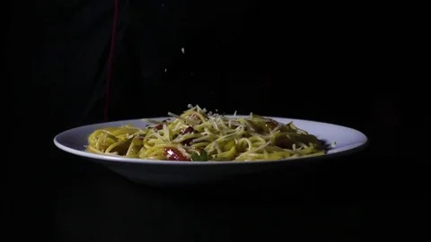 Chef throws parmesan pasta slow motion Stock Footage 72432929