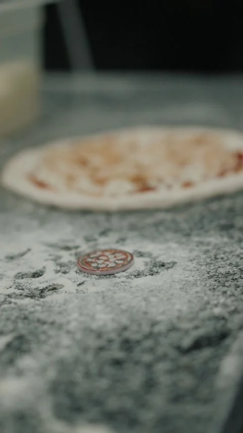 The chef throws a token in front of a pizza Stock Footage 327466793