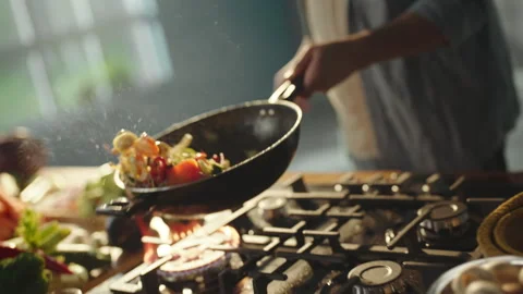 Chef tossing vegetable pan Stock Footage 311835026