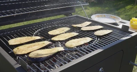  Chef Turns The Eggplant On The Grill Stock Footage 107325758