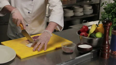 Chef unpacking rib eye steak, medium shot Stock Footage 66076932