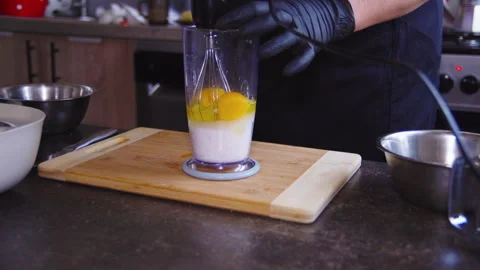 Chef using blender to mix ingredients Stock Footage 307312566