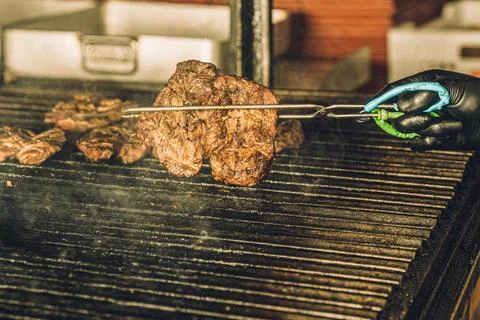 Chef Using Gill in Restaurant Stock Photos