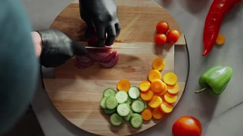 Chef using a knife cutting fresh raw sqaush. Stock Footage 267866786