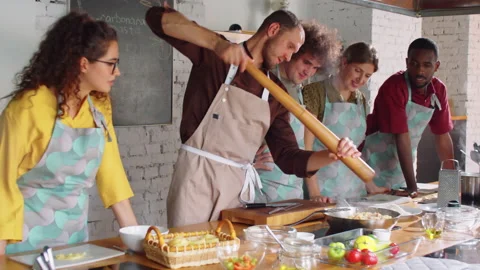 Chef Using Large Pepper Mill while Cooking Food during Master Class Stock Footage 155837896