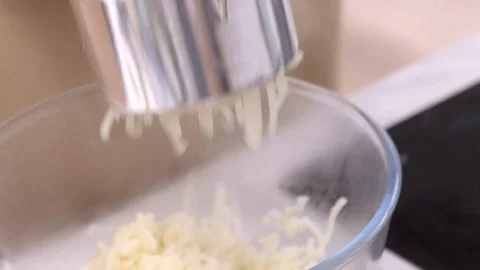 Chef using masher Stock Footage 93730833