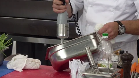 Chef using mixer on the kitchen Stock Footage 80894683