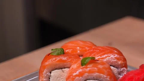 Chef using tweezers to place leaves of greens on sushi in Philadelphia, Stock Footage 269568650