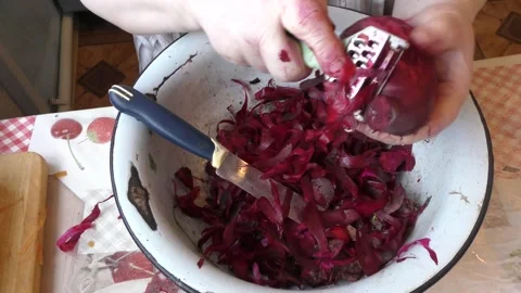 The chef washes and peels the beets with a knife Stock Footage 166706813
