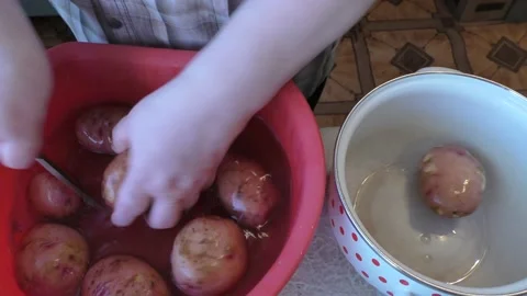The chef washes the potatoes Stock Footage 165496260