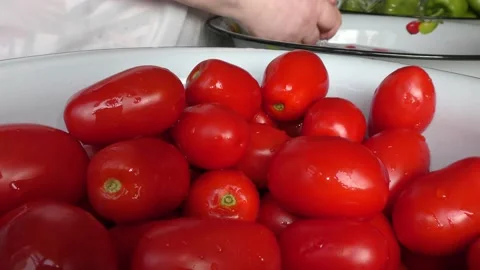 The chef washes the tomatoes with water Stock Footage 138721325