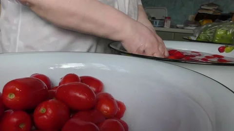 The chef washes the tomatoes with water Stock Footage 138721391