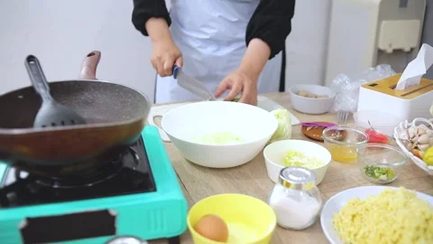 Chef washing and preparing fresh green bok choy vegetables in bowl for cooking Stock Footage 341487066