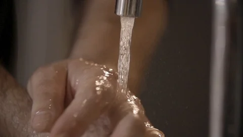 Chef is washing hands in kitchen close up Vídeo Stock 93536172