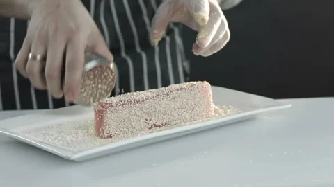 A chef wearing gloves sprinkle sesame tuna fillet Stock Footage 86283745