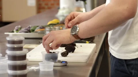 Chef weighing truffle Stock Footage 92076296