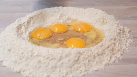 Chef whisking flour and eggs Stock-Footage 131310909