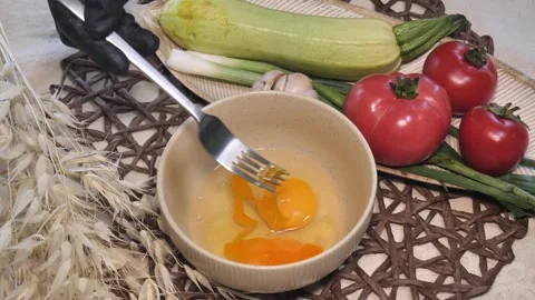 Chef Whisks Eggs in the Kitchen Stock Footage 311268965