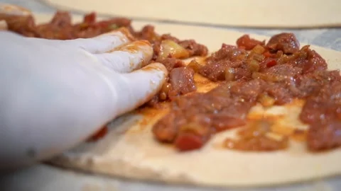 Chef who makes Turkish lahmacun and pita. Stock Footage 150093033