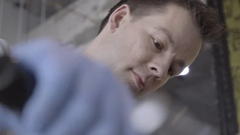 Chef who's working in the kitchen with his Food Slicer. Close-Up. 4k. High Stock Footage 93849560