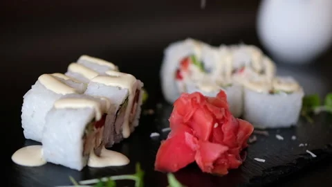 The chef will sleep with aromatic spices on Japanese sushi Video stock 155866012