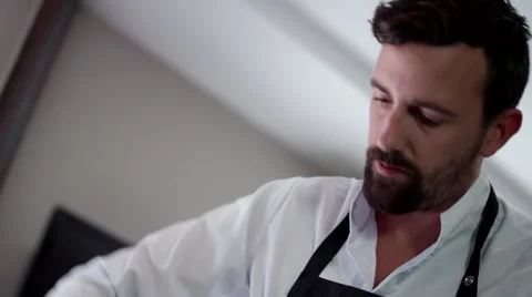 Chef working at kitchen. Stock Footage 64117199