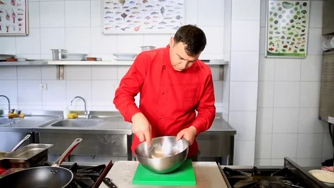 Chef is working in the kitchen Stock Footage 83643401